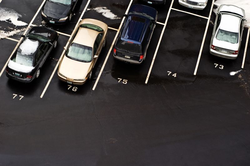 Signs Your Commercial Parking Lot Needs Asphalt Sealing